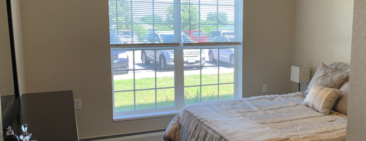 sand prairie - apartment interior: bedroom with large windows